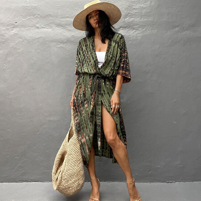 Army-green printed cover-up with a long front opening.
