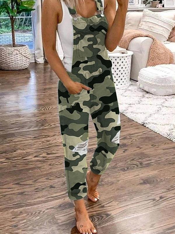 Camouflage-patterned overalls with shoulder straps and distressed knees.