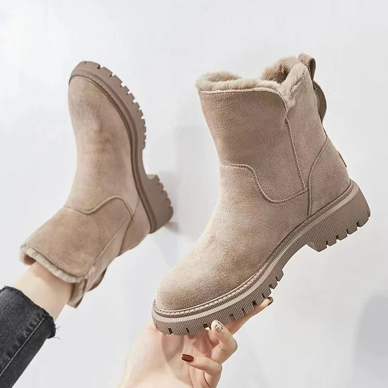 Apricot boots showing the rounded toes and raised soles.