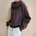 Brown jumper with a deep folded neckline.
