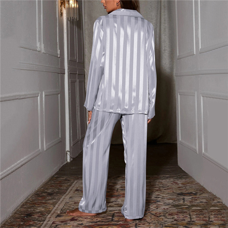 Back view of the light blue striped satin pyjama set.