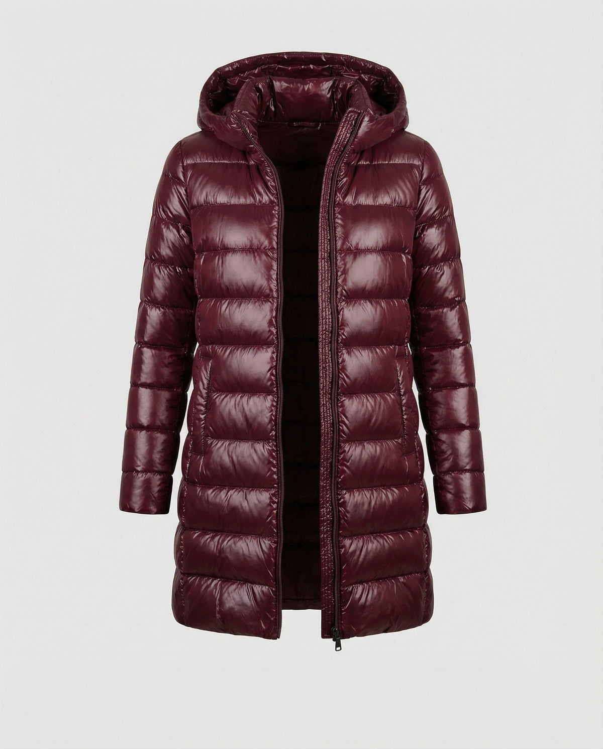 Burgundy long quilted jacket with a hood and central zip.