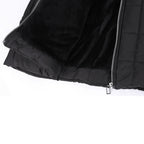 Black coat lining and front zip shown close up.