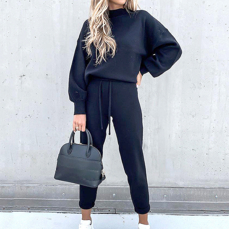 Navy blue lounge set with balloon sleeves and high-waist trousers.