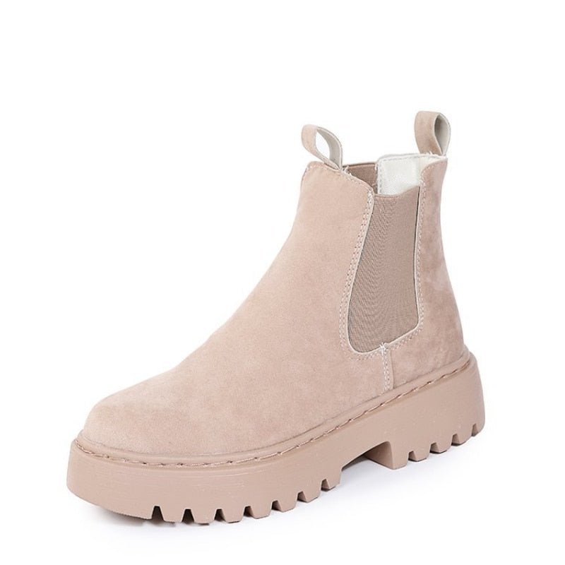 Apricot Chelsea boot with pale lining visible at the opening.