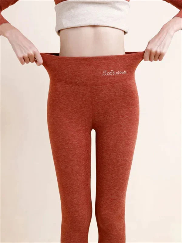 Maple red leggings with a wide waistband and small original white lettering.
