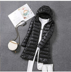 Black hooded puffer coat with a front zip.
