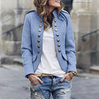 Sky blue Spada blazer with decorative buttons and long sleeves.