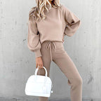 Taupe lounge set with a drawstring waist and long sleeves.