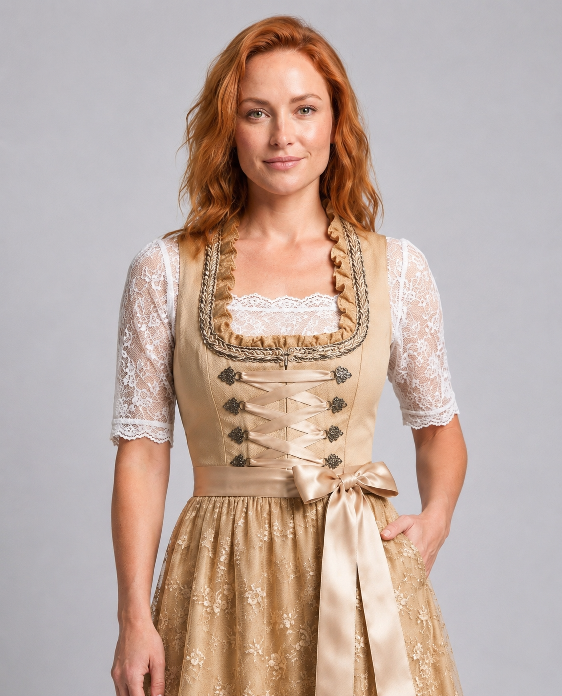 Close view of the dirndl bodice showing decorative eyelets, ribbon lacing and waist bow.