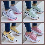 Collage of white, green, yellow and pink star-patch trainers.