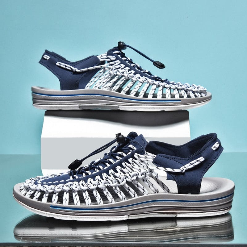 Blue and white cord sandals shown in side and three-quarter views.