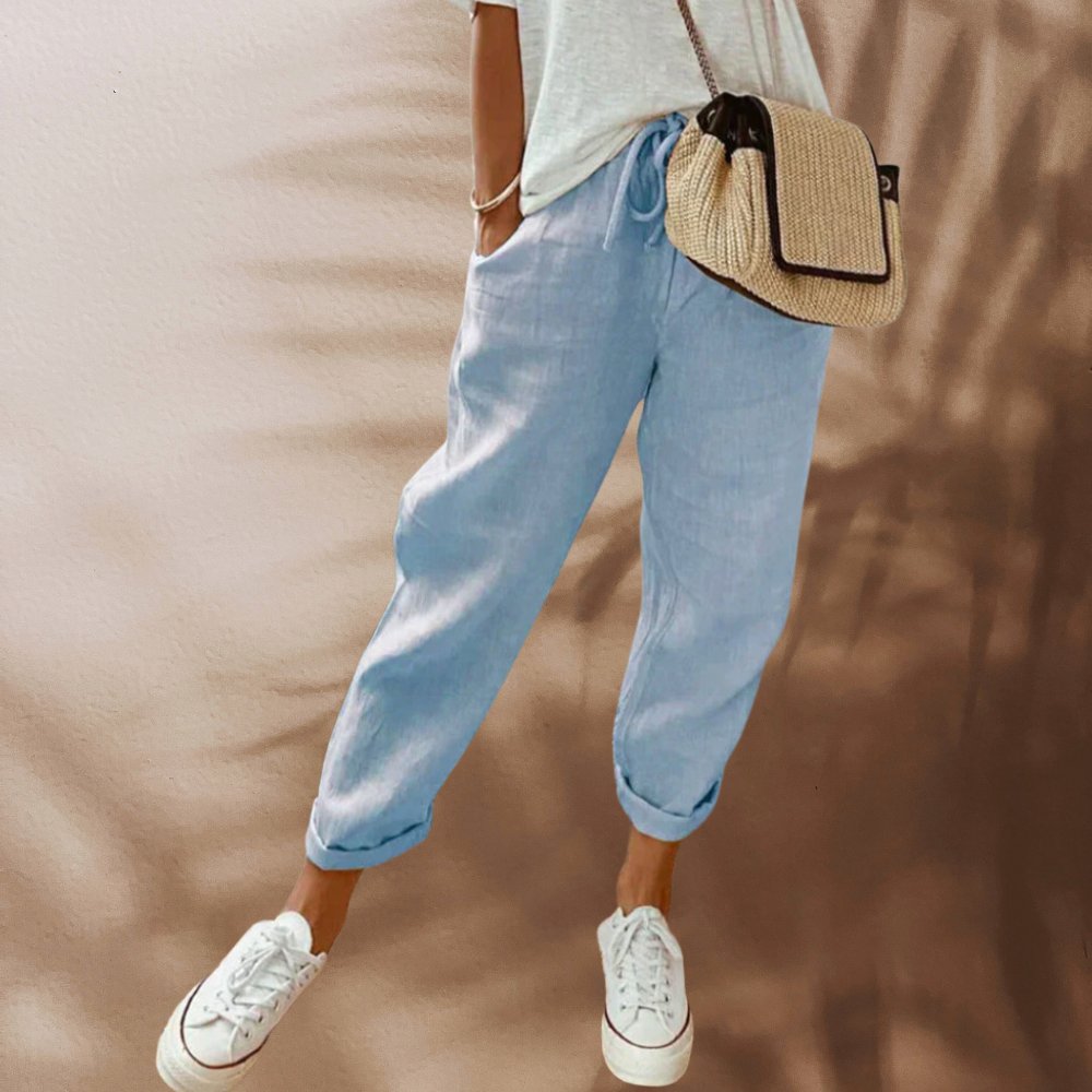 Light-blue casual trousers with side pockets.