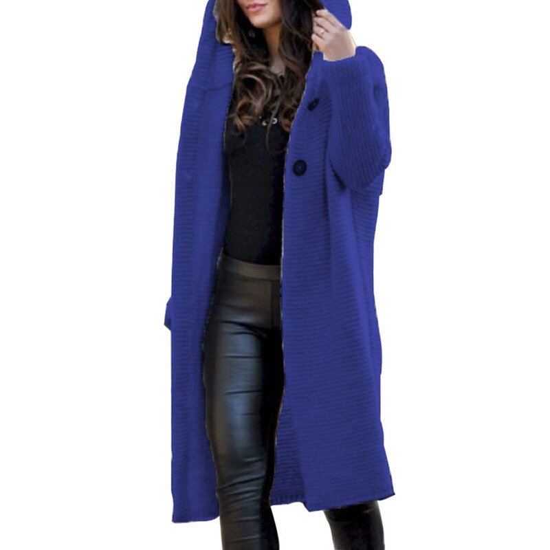 Dark blue hooded knit cardigan worn over a black outfit.