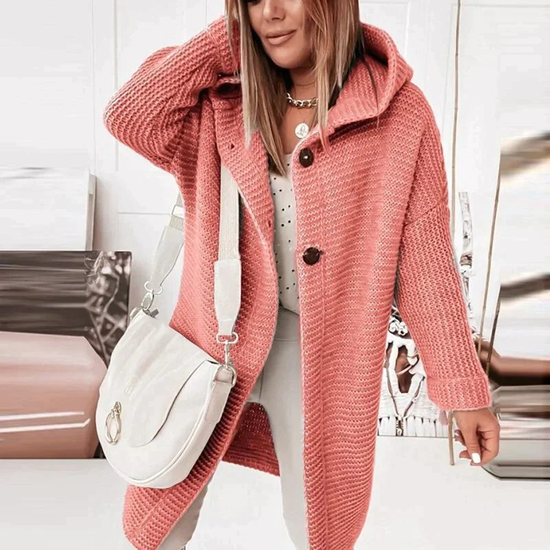 Coral-red hooded knit cardigan with dark buttons and dropped shoulders.