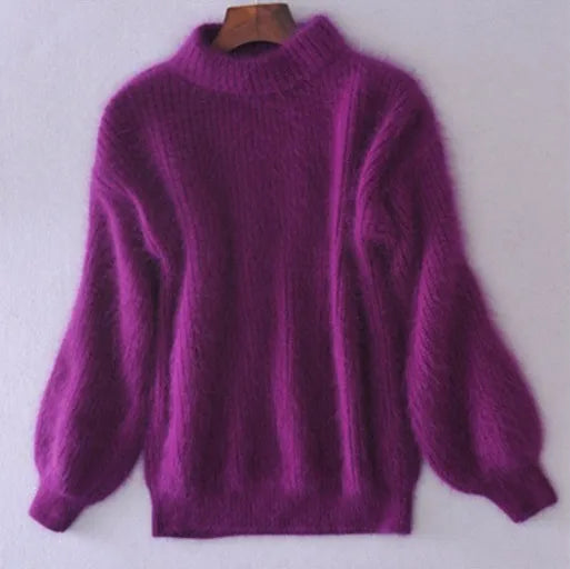 Purple jumper with a fuzzy texture and full sleeves.