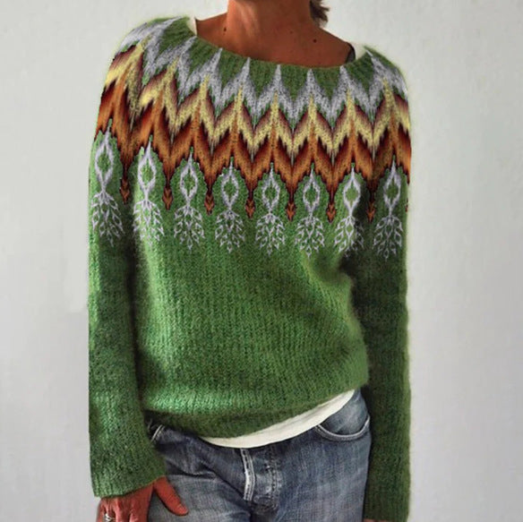 Green knit jumper with multicoloured zigzag and leaf-like motifs.