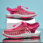 Pink cord sandals shown in side and three-quarter views.