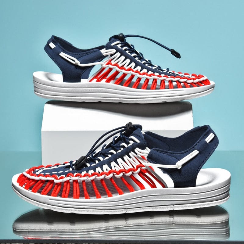 Blue, red and white cord sandals shown on display blocks.