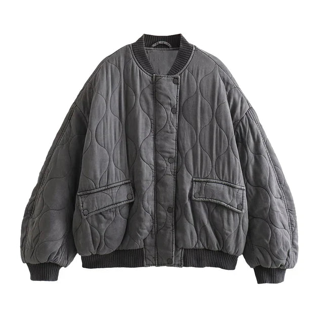 Full front view of the grey quilted bomber jacket.