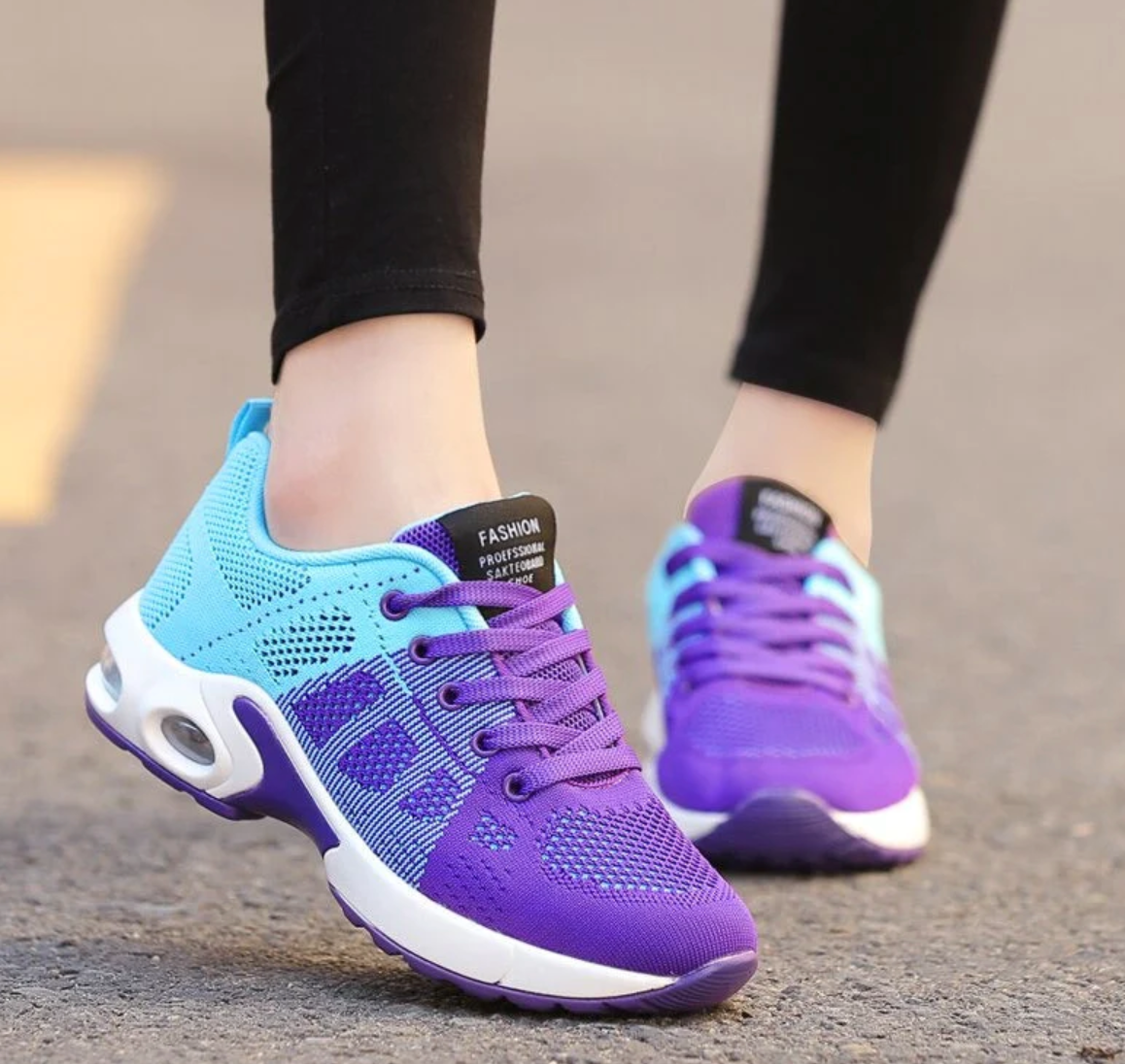 Turquoise and purple trainers with purple laces.