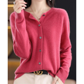 Dark pink button-front cardigan with the top button open and long sleeves.