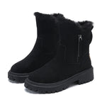Black side-zip boots with fluffy upper edges on a white background.