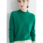 Green plain jumper with long sleeves and a high neckline.
