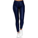 Blue skinny jeggings viewed from the front with trainers.