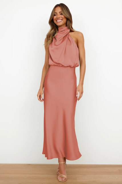 Coral-coloured midi dress with a softly flared hem.
