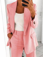 Pink jacket showing lapels, cuff buttons and front flap pocket.