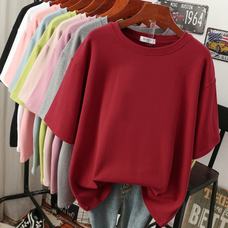 Wine-red T-shirt with dropped shoulders displayed on a hanger.