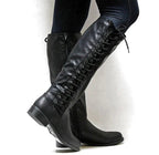 Black tall lace-up boots with low heels and an inner zip.