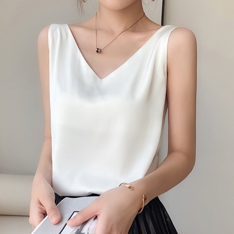 White Trigala tank top with a V neckline and smooth finish.