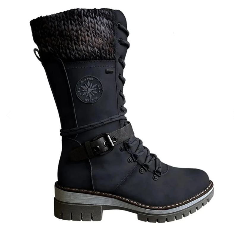 Black tall boot with braided bands and a low block heel.
