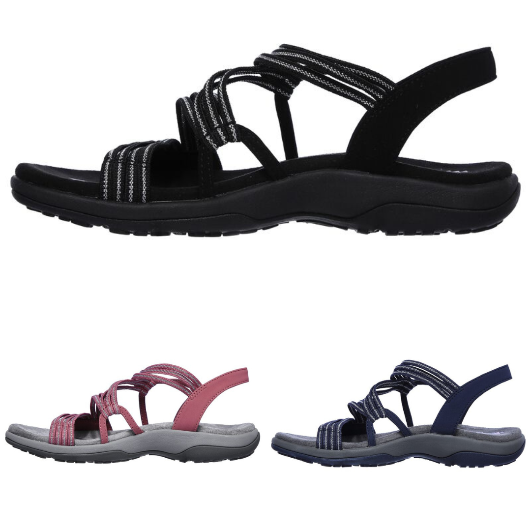 Side view of a black strappy sandal with pink and blue colour examples.