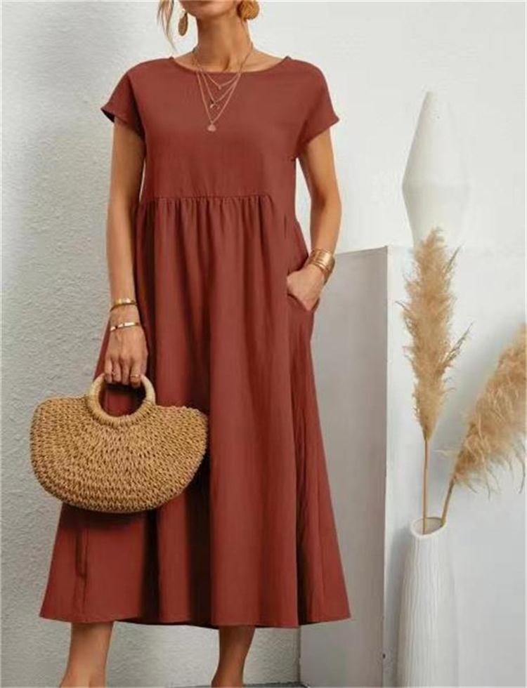 Orange Ginovu dress with a round neckline and side pockets.