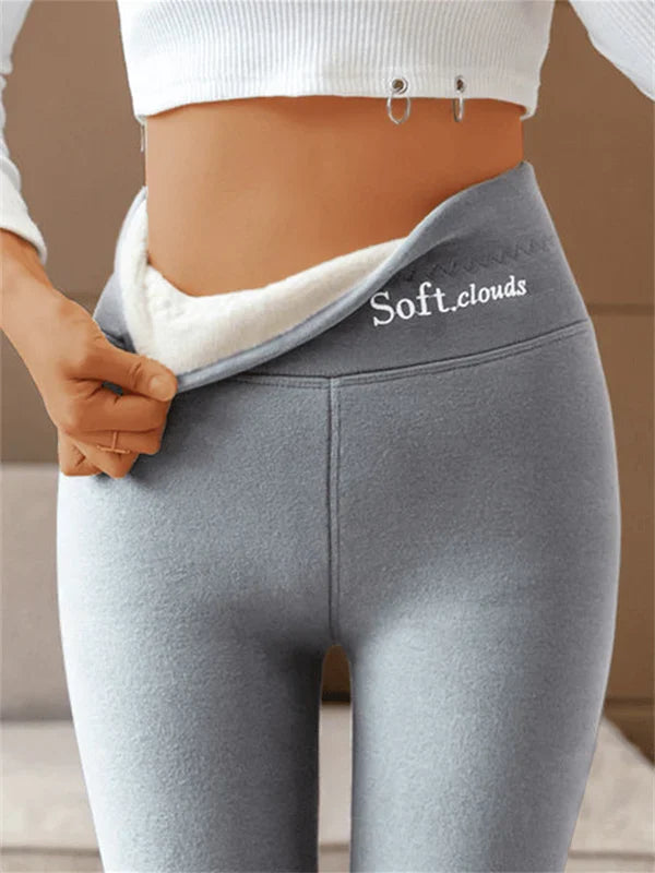 Grey leggings with a wide waistband folded down at one side.