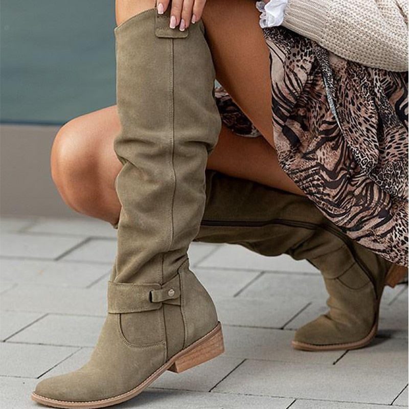 Olive-green knee-high boot with a small ankle strap and low heel.