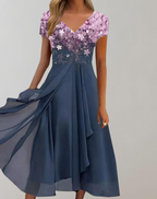 Pink floral top with a blue chiffon skirt.