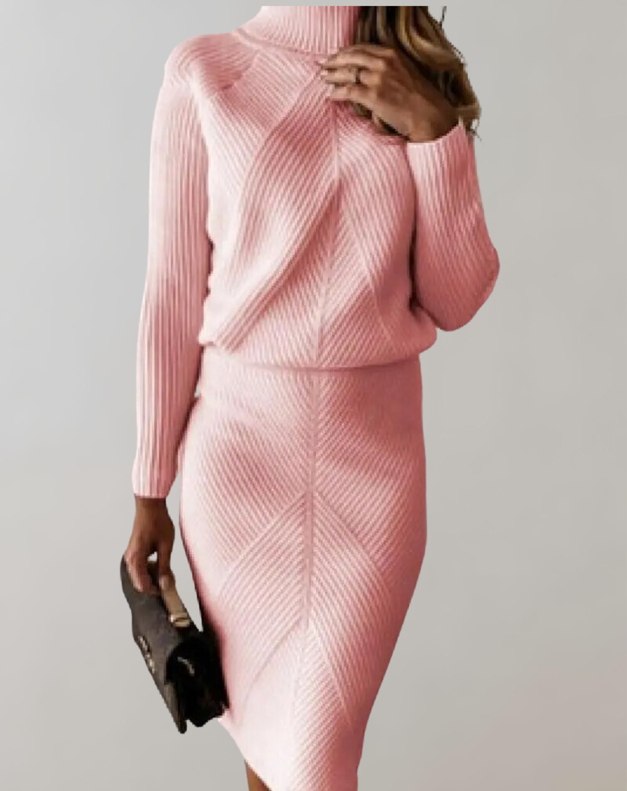 Pink turtleneck jumper and matching skirt shown from the front.