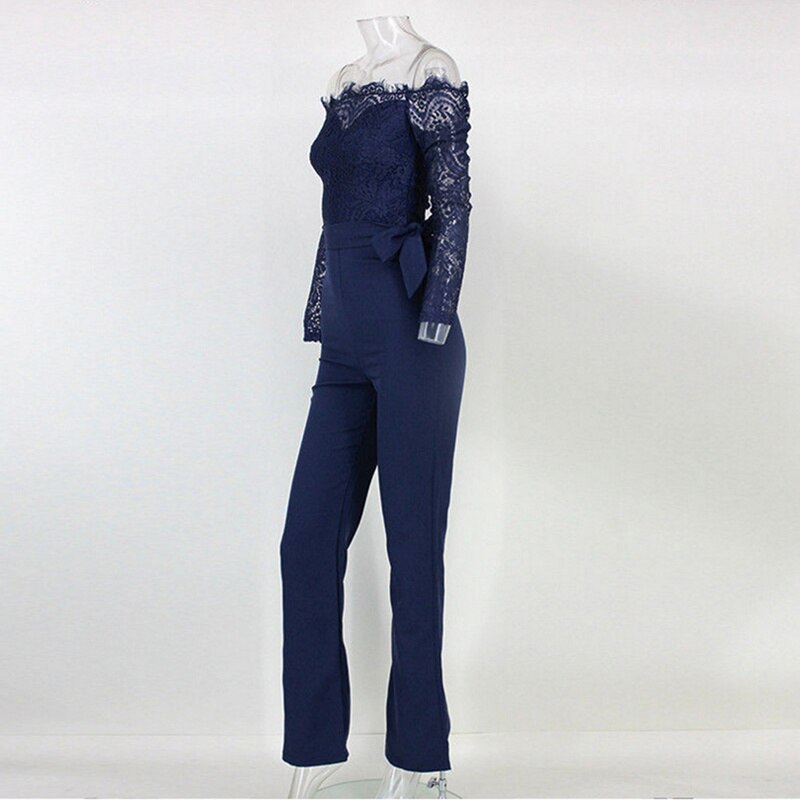 Dark blue lace jumpsuit with a matching waist tie and long sleeves.