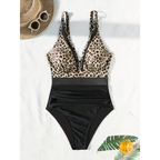 Swimsuit laid flat with leopard-print bust panels above a black lower section.