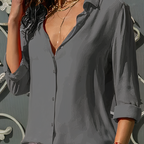 Grey collared chiffon blouse shown with rolled sleeves.