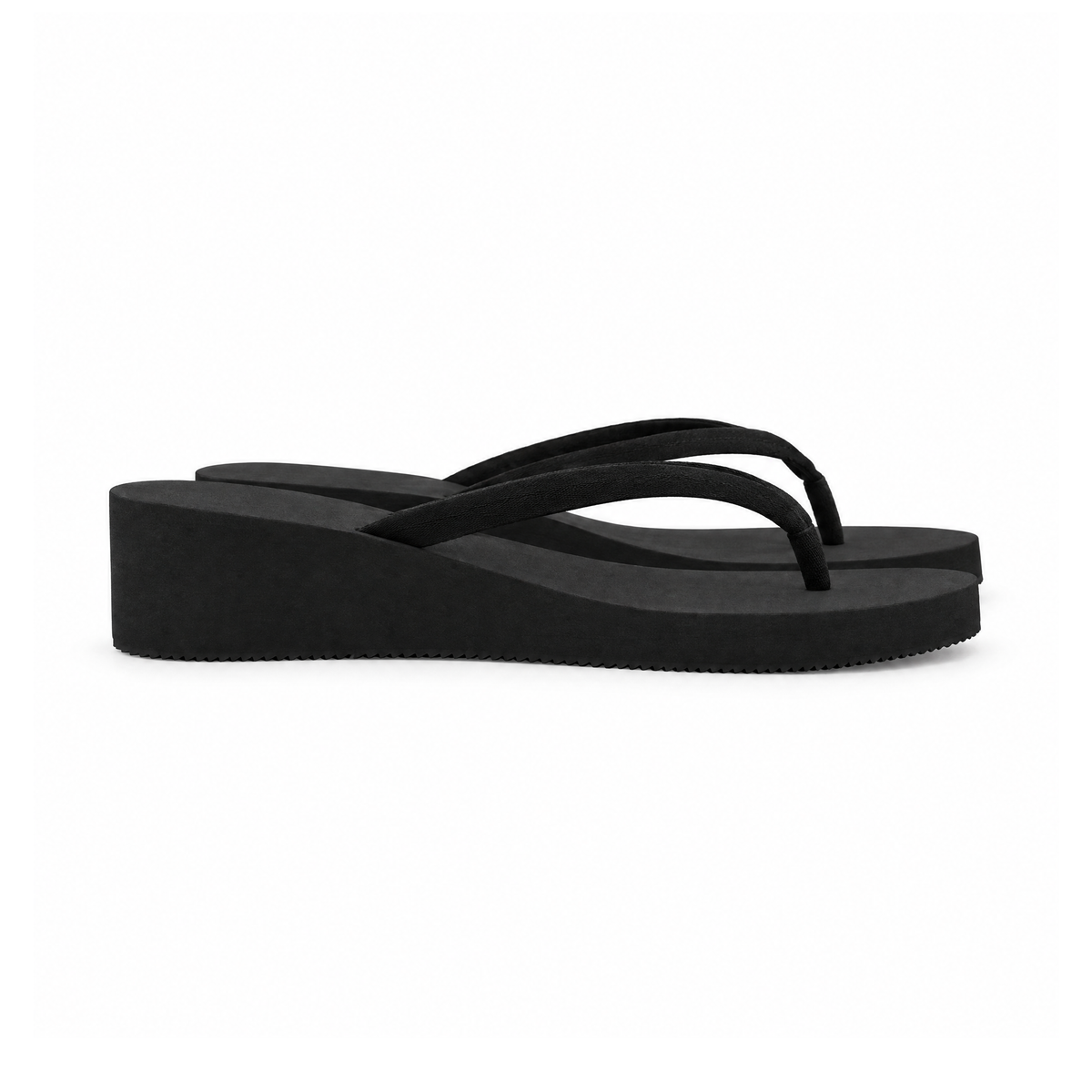 Wedge Flip-Flops With Toe-Post Straps and a Platform Sole — angled view