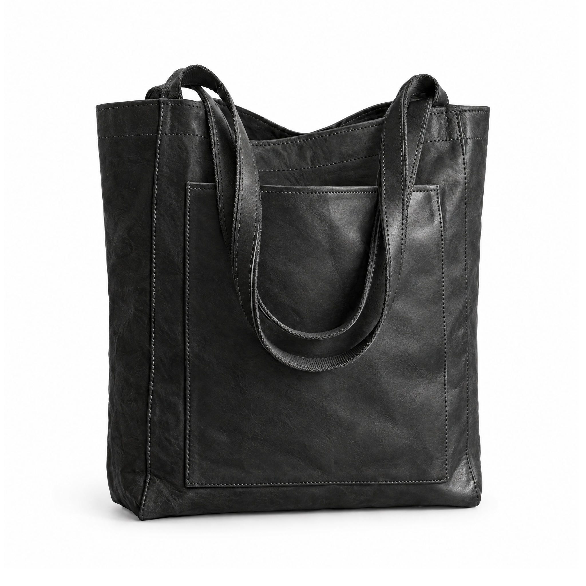 Black shoulder tote bag with long handles and a front patch pocket, angled view