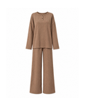 Coffee knit lounge set, front view: henley top with two buttons, dropped shoulders and zigzag textured knit over full-length wide-leg pants, on white