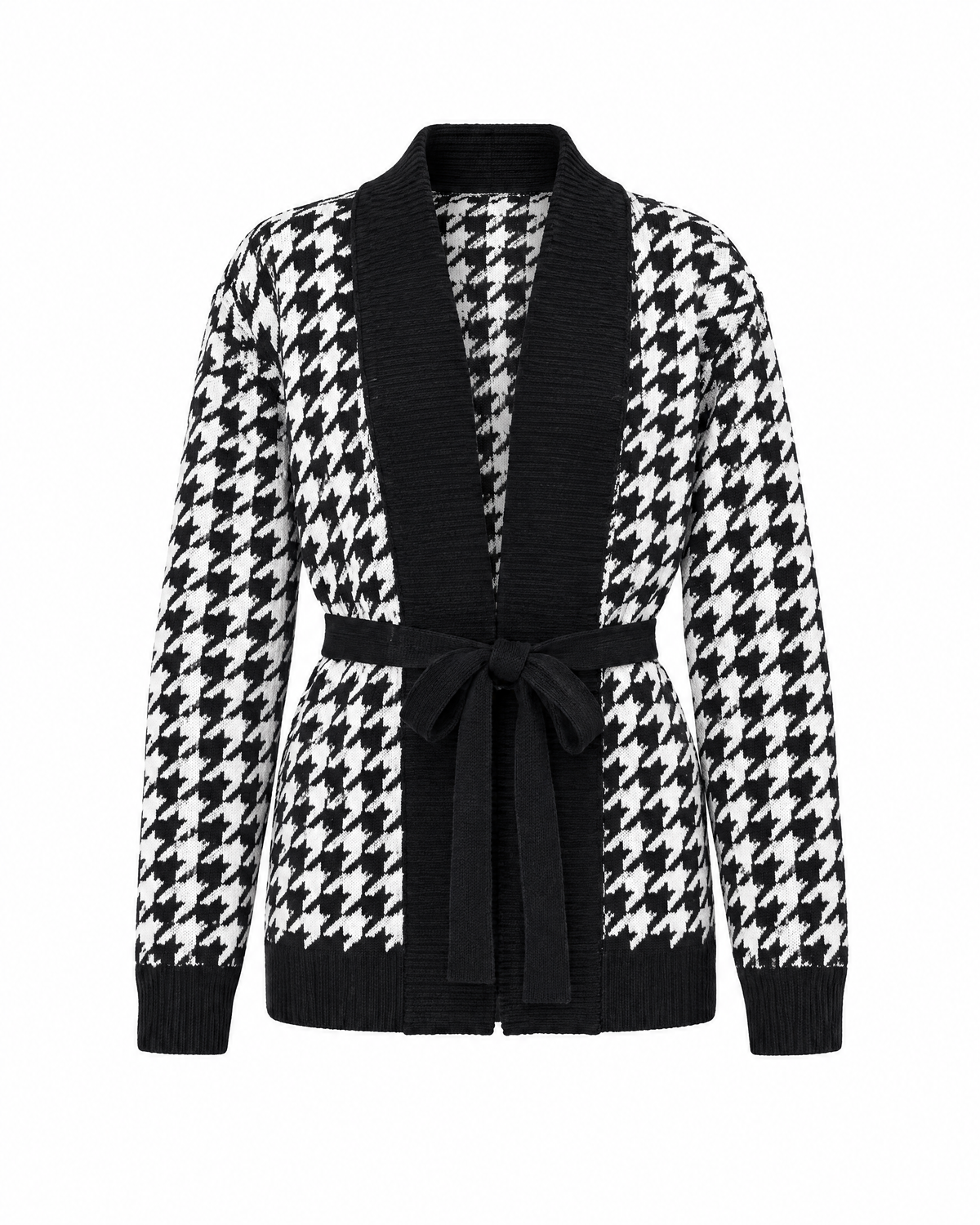 Black/White houndstooth knit cardigan photographed straight on, open front with a black ribbed shawl band and a tie belt knotted at the waist