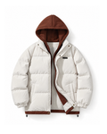 Cream oversized puffer jacket with a rust brown fleece hood, shown open from the front on a white background.