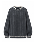 Oversized cable knit sweater with dash stitch trim in Dark Grey, front view: vertical cables, cream dash stitches and tipping at the neck, cuffs and hem